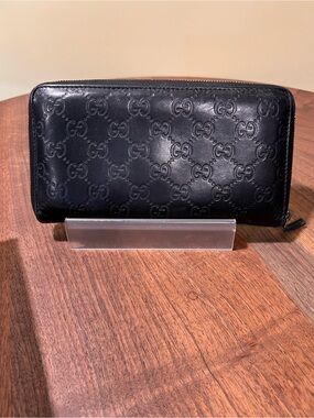 Gucci Black Embossed GG Zip Wallet